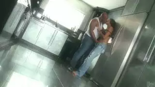 The brutal black dude thrusts his fat dick in Evanni Solei's mouth in a kitchen